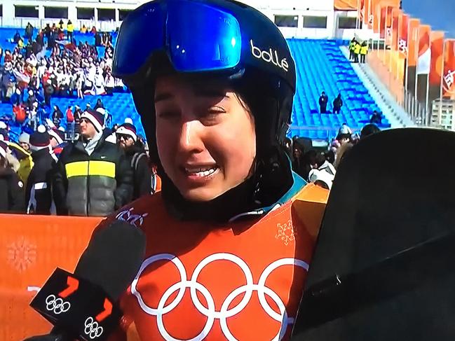 A tearful Belle Brockhoff is interviewed by Channel 7 after the women's snowboard cross. Photo: Channel 7