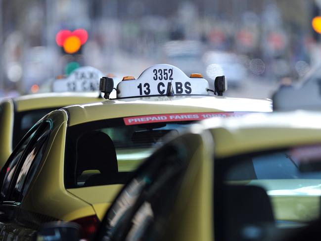 Generic and stock images around Melbourne CBD. Taxi rank outside Flinders Station - 13 Cabs