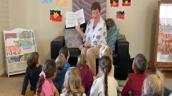 Suzie Carey reads to the children. Picture: Supplied