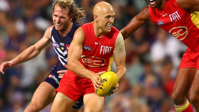 PERTH, WESTERN AUSTRALIA - APRIL 02: Gary Ablett of the Suns looks to pass the ball during the round two AFL match between the Fremantle Dockers and the Gold Coast Suns at Domain Stadium on April 2, 2016 in Perth, Australia. (Photo by Paul Kane/Getty Images)