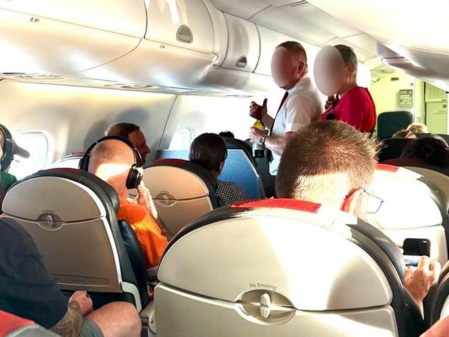 Leader of the Opposition Steven Miles drinking red wine on a flight. Picture: Supplied