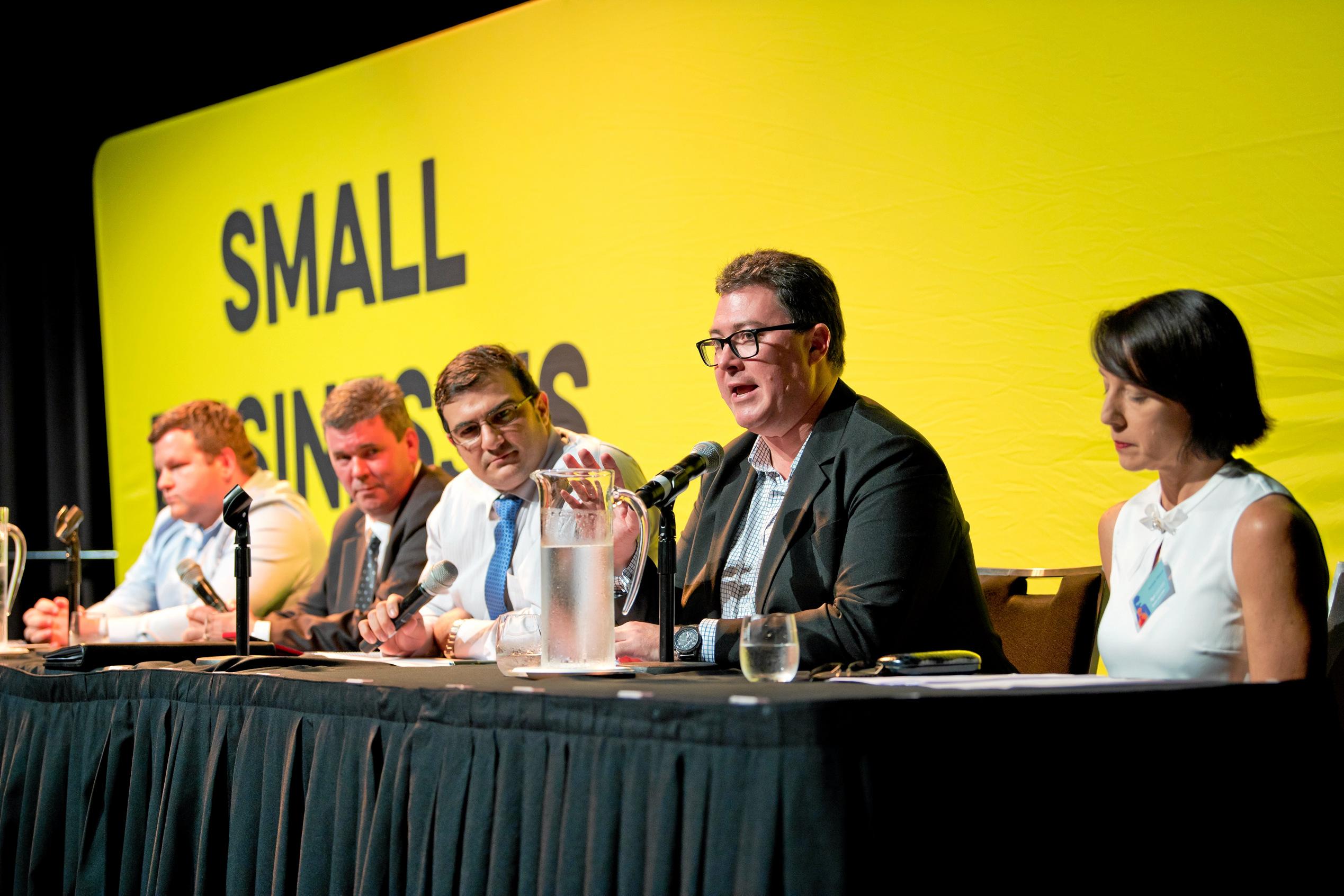 Current member for Dawson, George Christensen, speaks at the 2019 Dawson Debate in Mackay flanked by candidates Brendan Bunyan, Colin Thompson, and Belinda Hassan. Simon Vigilante (centre) moderated the session.