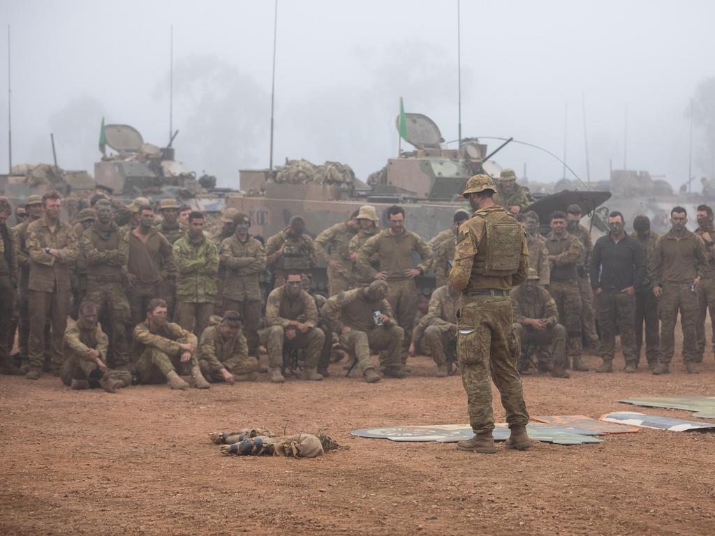 Five-hundred troops set to move to Townsville in the coming years are projected to come along with 700 partners and children.