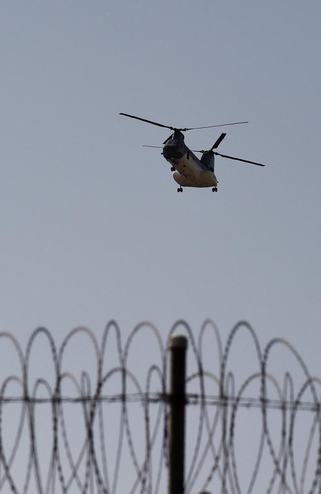 A US military helicopter is pictured flying above the US embassy in Kabul. Picture: AFP