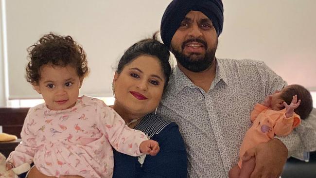 Victorian couple Hardip and Muneet Narang with their daughters Osheen and Ziva. The couple haven't seen their 18mth old daughter Ziva since March last year. She is trapped in Mumbai with grandparents.