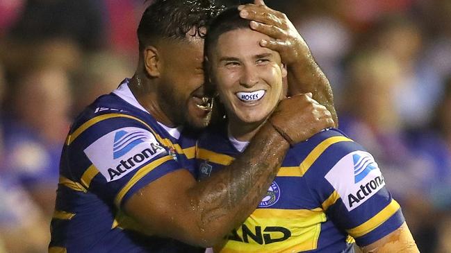 Mitchell Moses celebrates a try for the Eels.