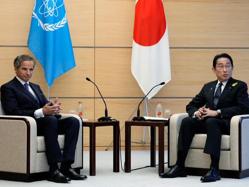 Rafael Grossi, Director General of the International Atomic Energy Agency (IAEA), speaks with Japan's Prime Minister Fumio Kishida.