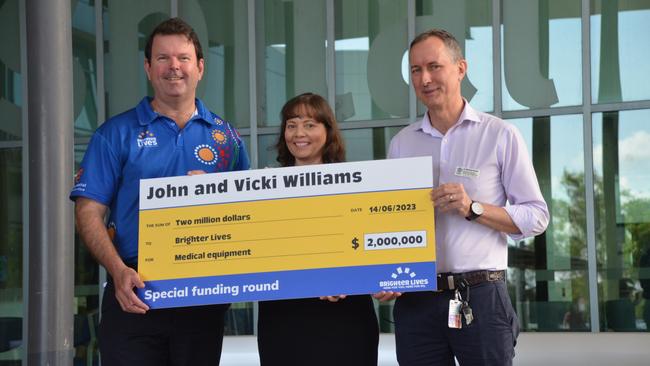 Townsville Hospital and Health Service CEO Keiran Keys, director of medical services (rural and Indigenous) Matt Bryant and Brighter Lives CEO Tanya Busoli accept a cheque for $2 million