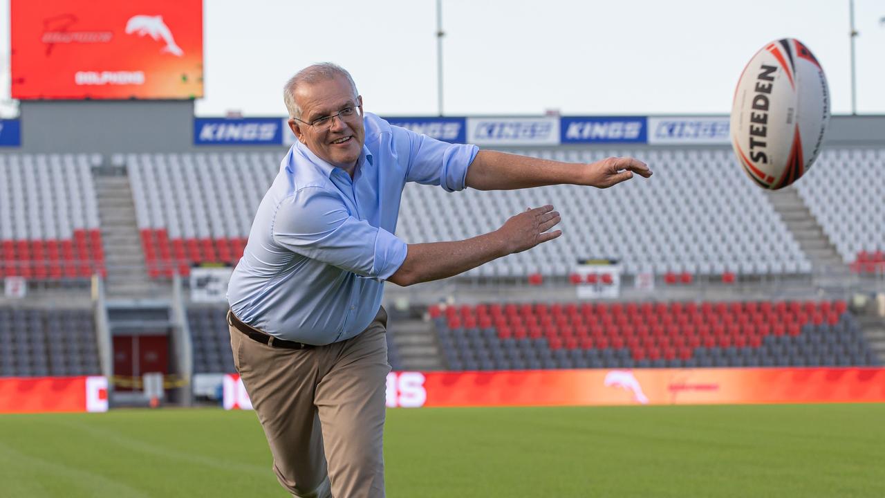 Scott Morrison tried his hand at rugby league while visiting Redcliffe for Dolphins Stadium Centre of Excellence Announcement of $15 million dollars. Jason Edwards