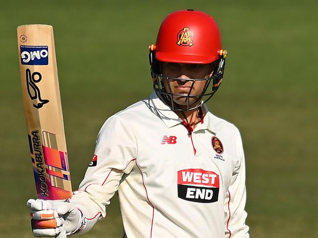 BRISBANE, AUSTRALIA - OCTOBER 22: Alex Carey of South Australia celebrates his half century during the Sheffield Shield match between Queensland and South Australia at Allan Border Field, on October 22, 2024, in Brisbane, Australia. (Photo by Albert Perez/Getty Images)