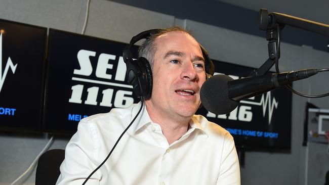 Sports commentator Gerard Whateley broadcasting at the SEN studio. Picture: Josie Hayden