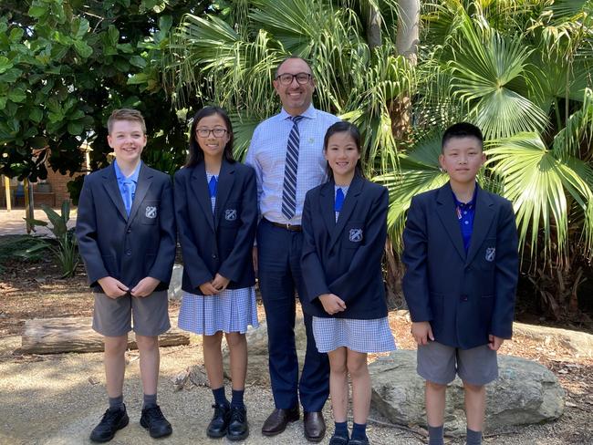 North Rocks Public School principal Robert Ieroianni  with Luke Brooks, Ashley Tu, Hannah Chung and Brian Lee.