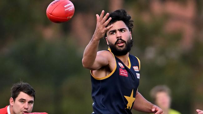 Essendon Doutta Stars’ Andre Srour keeps his eye on the ball. Picture: Andy Brownbill