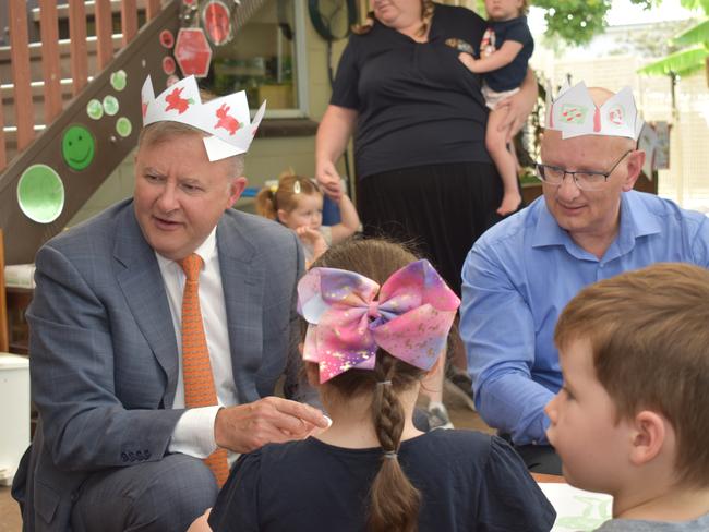 Anthony Albanese with Blair MP Shayne Neumann visiting a childcare centre.