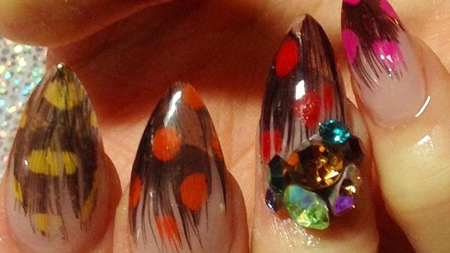 It took five and half hours for Miss Frou Frou nail stylist Elise Archer to do a feather nail encapsulation complete with Swarovski crystals.