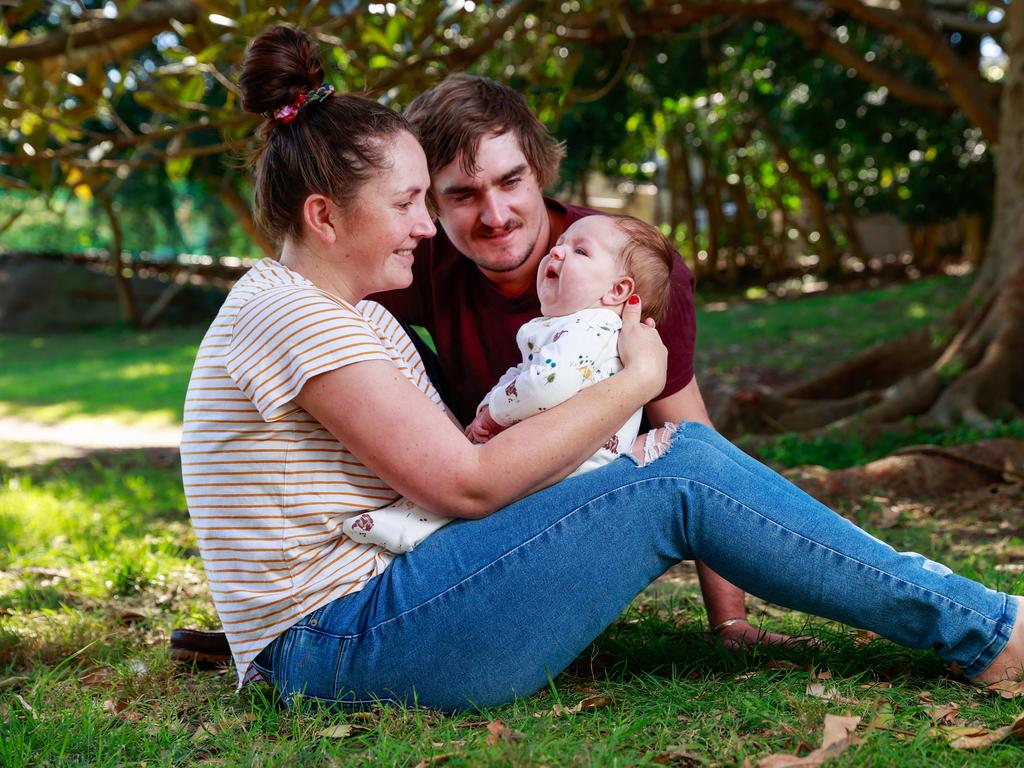 Jessie Evans and Billy Blacker with their four-month-old son Rocka in Double Bay. Picture: Justin Lloyd