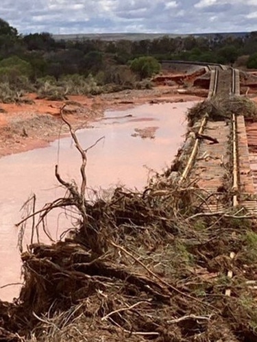 Unseasonally heavy rain has caused extensive damage to the Adelaide to Darwin railway and the Stuart Highway. Picture: ARTC