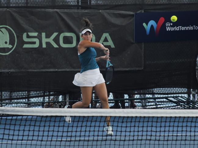 Cairns hometown hero Sienna Jensen in action at the ITF World Tennis Tour Cairns Tennis International Tournament against Sophie McDonald in round 1. Picture: Jake Garland