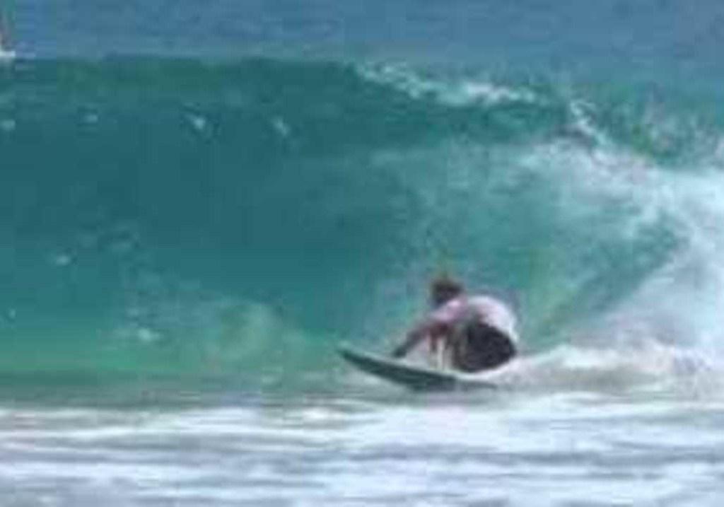 SPORTS:    Surfer Mick Fanning Shows Skills on a Queensland Tube Ride