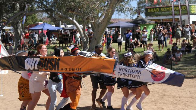 Punters from far and wide enjoying the Henley on Todd in Alice Springs, Saturday, August 17, 2024. Picture: Gera Kazakov