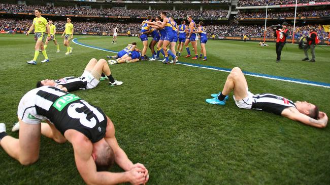 The Pies players were instantly shattered at the end of the match. Picture: AFL Media