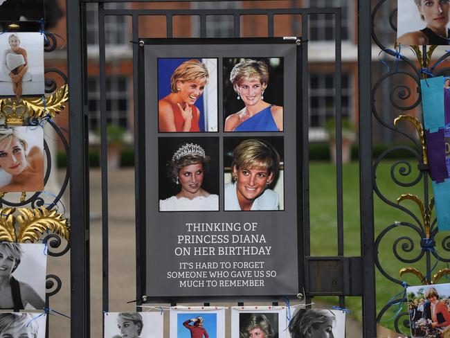 More tributes attached to the gates of Kensington Palace. Picture: AFP