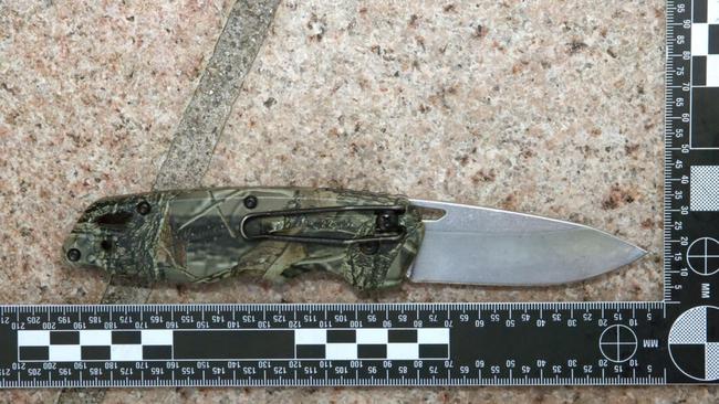 The knife that Luke Gilbert, 24, produced when police asked what he had under his jumper. The Milwaukee fast back folding camo knife can be opened with one hand and it is therefore an offence to carry it in public. Picture: Supplied