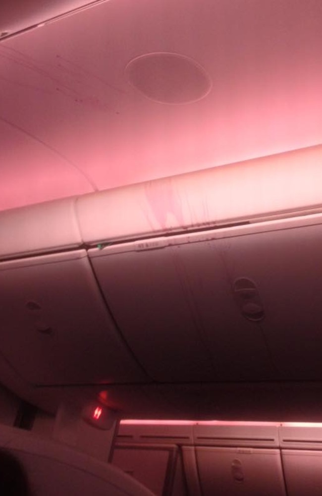 A passenger posted this pic online of the plane’s red wine splattered ceiling. Picture: ollieislame/Reddit