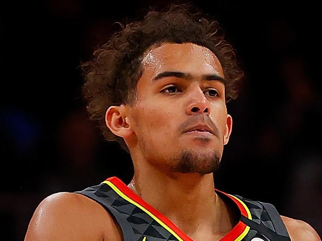 ATLANTA, GEORGIA - FEBRUARY 26: Trae Young #11 of the Atlanta Hawks reacts after hitting a three-point basket against the Orlando Magic in the first half at State Farm Arena on February 26, 2020 in Atlanta, Georgia. NOTE TO USER: User expressly acknowledges and agrees that, by downloading and/or using this photograph, user is consenting to the terms and conditions of the Getty Images License Agreement.   Kevin C. Cox/Getty Images/AFP == FOR NEWSPAPERS, INTERNET, TELCOS & TELEVISION USE ONLY ==