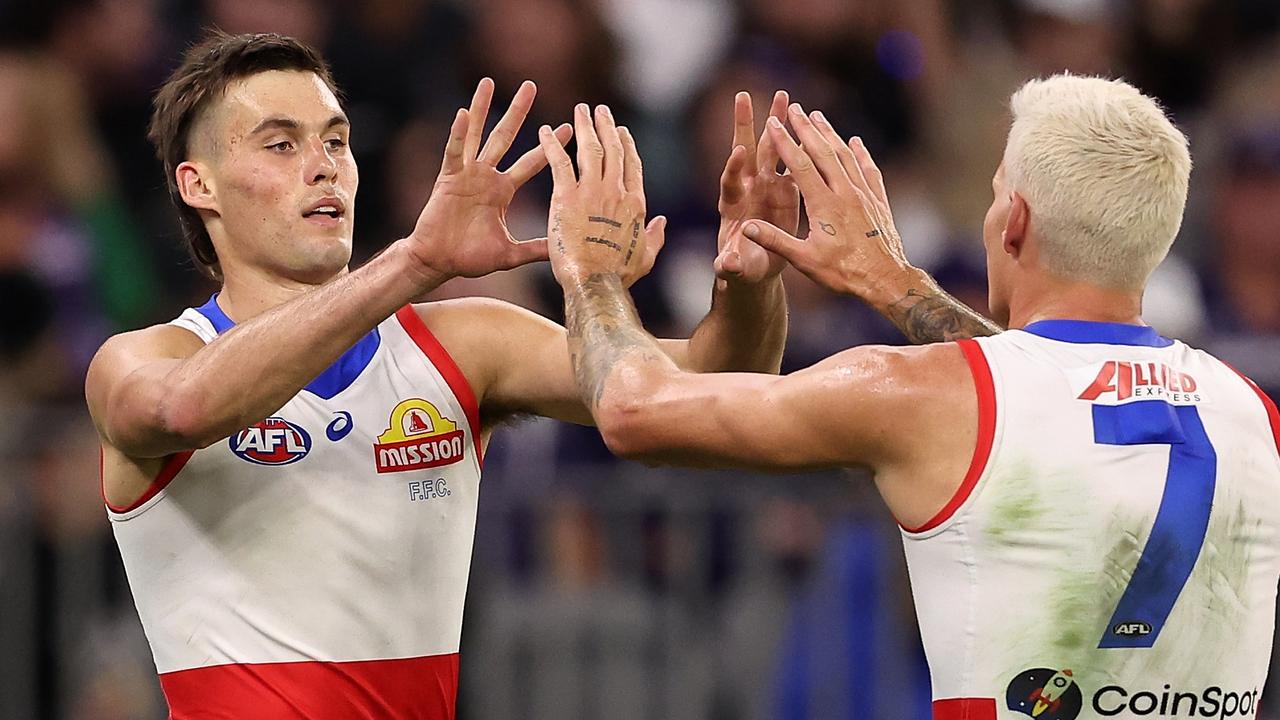 Western Bulldogs coach Luke Beveridge says ‘Darwinism’ is behind his bid to play Sam Darcy (left) and Rory Lobb (right) together with Aaron Naughton and Jamarra Ugle-Hagan in one forward line. Picture: Paul Kane / Getty Images