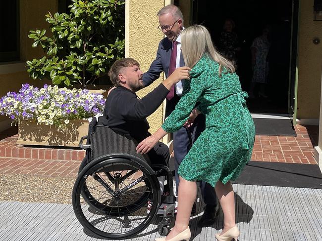 Prime Minister Anthony Albanese and his partner, Jodie Haydon, were seen embracing former Australian of the Year Dylan Alcott as his term came to an end. Picture: NCA NewsWire / Ellen Ransley