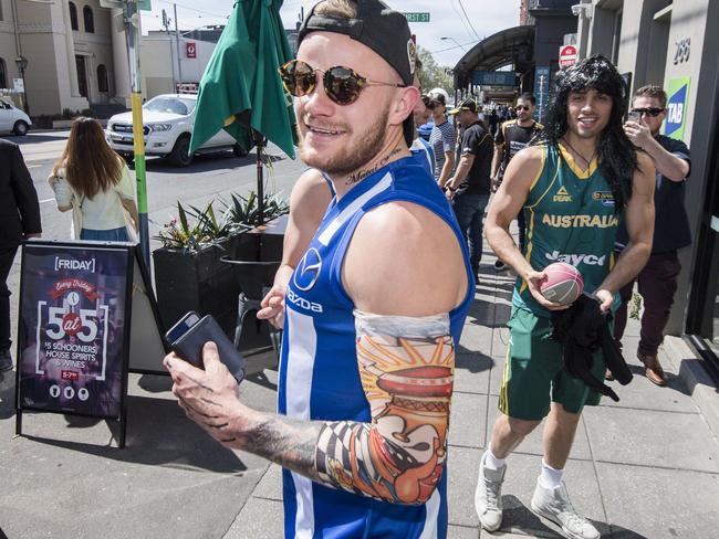 Brandon “Dustin Martin” Ellis shows off his fresh sleeve of tatts. Picture: Jason Edwards