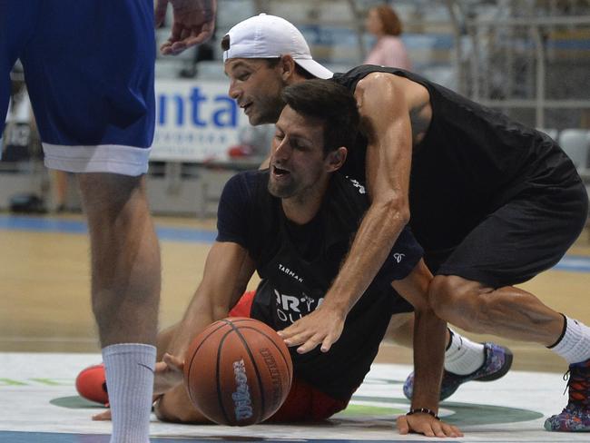 Grigor Dimitrov, right, plays basketball with world no.1 tennis player Novak Djokovic in Zadar, Croatia last Thursday. Picture: AP