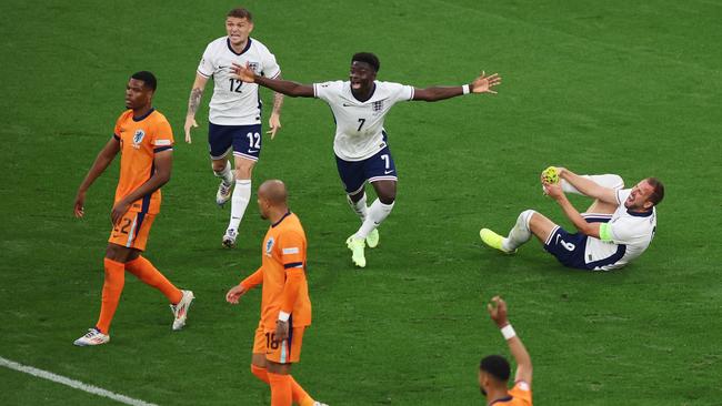 Harry Kane of England reacts after being fouled by Denzel Dumfries. (Photo by Alex Grimm/Getty Images)