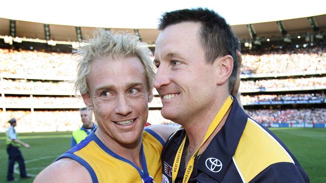 Coach John Worsfold with footballer Michael Braun. AFL football – West Coast Eagles vs Sydney Swans grand final match at MCG 30 Sep 2006.