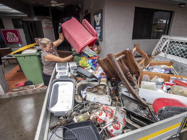 Clean-up begins at a home in Idalia, Townsville after flooding. Picture: Glenn Hunt