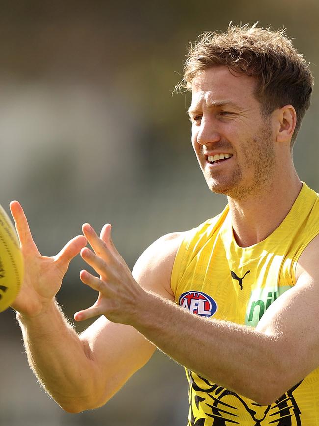 Lambert is a Richmond premiership player.