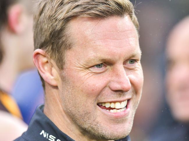 LAUNCESTON, AUSTRALIA - AUGUST 24: Sam Mitchell, Senior Coach of the Hawks celebrates after the final siren during the round 24 AFL match between Hawthorn Hawks and North Melbourne Kangaroos at University of Tasmania Stadium, on August 24, 2024, in Launceston, Australia. (Photo by Simon Sturzaker/AFL Photos/via Getty Images)