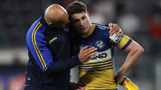 Parramatta's Mitchell Moses is consoled by Blake Ferguson after their loss in the NRL Semi Final between the Parramatta Eels and South Sydney Rabbitohs at Bankwest Stadium, Parramatta. Picture: Brett Costello