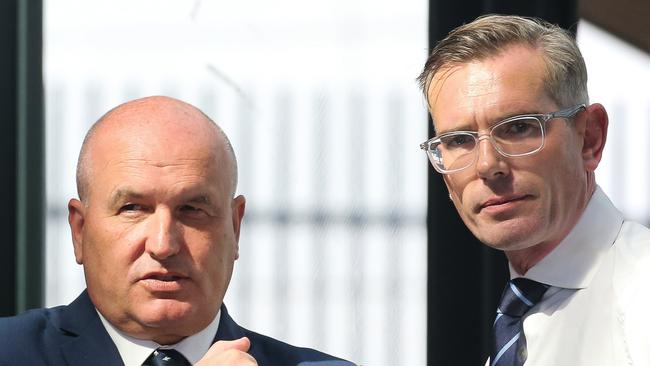 SYDNEY, AUSTRALIA - Newswire Photos MARCH 01 2023:  Minister for Transport David Elliott and The Premier Dominic Perrottet are seen chatting at Tullawong Railway Station ahead of a press conference in Sydney. Picture: NCA Newswire/ Gaye Gerard