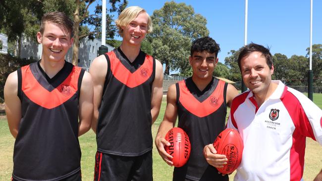 Triple Magarey Medallist James Allan with players (from left) Matthew Dnistriansky, Ned Carey and Xavier Tranfa, earlier this year. Picture: Rostrevor College