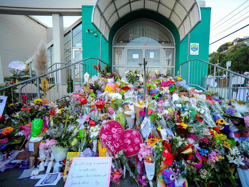 Flowers left by residents at a memorial site for victims of the Christchurch mosque attacks at an Islamic centre in Kilbirnie, Wellington. Picture: AFP