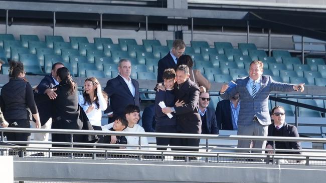 Miss Ole’s connections celebrate in the grandstand at Sandown. Picture: Scott Barbour / Racing Photos