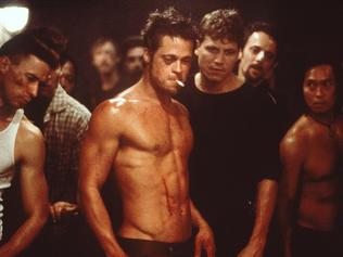 Actor Brad Pitt (cigarette) with Ed (Edward) Norton and others in scene from film ''Fight Club''. /Films/Titles/Fight/Club