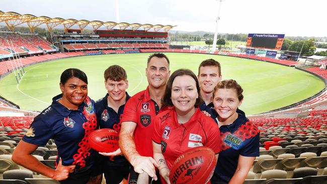 As part the Anzac Appeal Round game against Sydney on Sunday, the Gold coast Suns will be hosting two games between the QFES & Army at People First Stadium. Left to right,  Pamela Amber (Army) , Adam Dickenson (army), with Trev Butterfield and Kirra Braithwaite (Fire) and Jacob Raiston (Army) Mikayla Abson (army). Picture Glenn Hampson