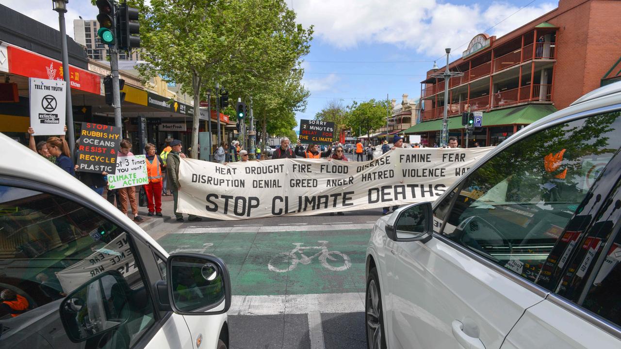 Extinction Rebellion protesters block traffic in Adelaide. Picture: Brenton Edwards