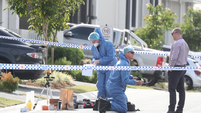 Police at the scene of Shane Bowden’s murder. Picture: Annette Dew