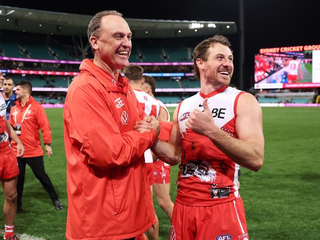 John Longmire and Harry Cunningham enjoy a Swans win. Picture: Matt King/AFL Photos/via Getty Images