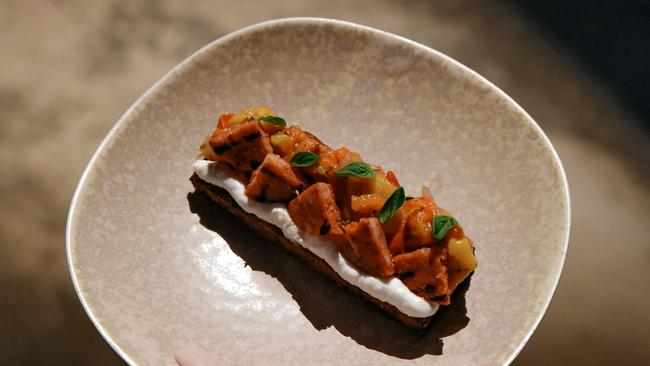 Potato, peperonata, goats curd at Aurora restaurant, Light Square. Picture: Jack Fenby