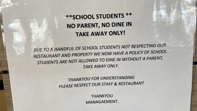 Sign at the front of KFC in Golden Grove saying students cannot dine in without parents. Picture: Supplied